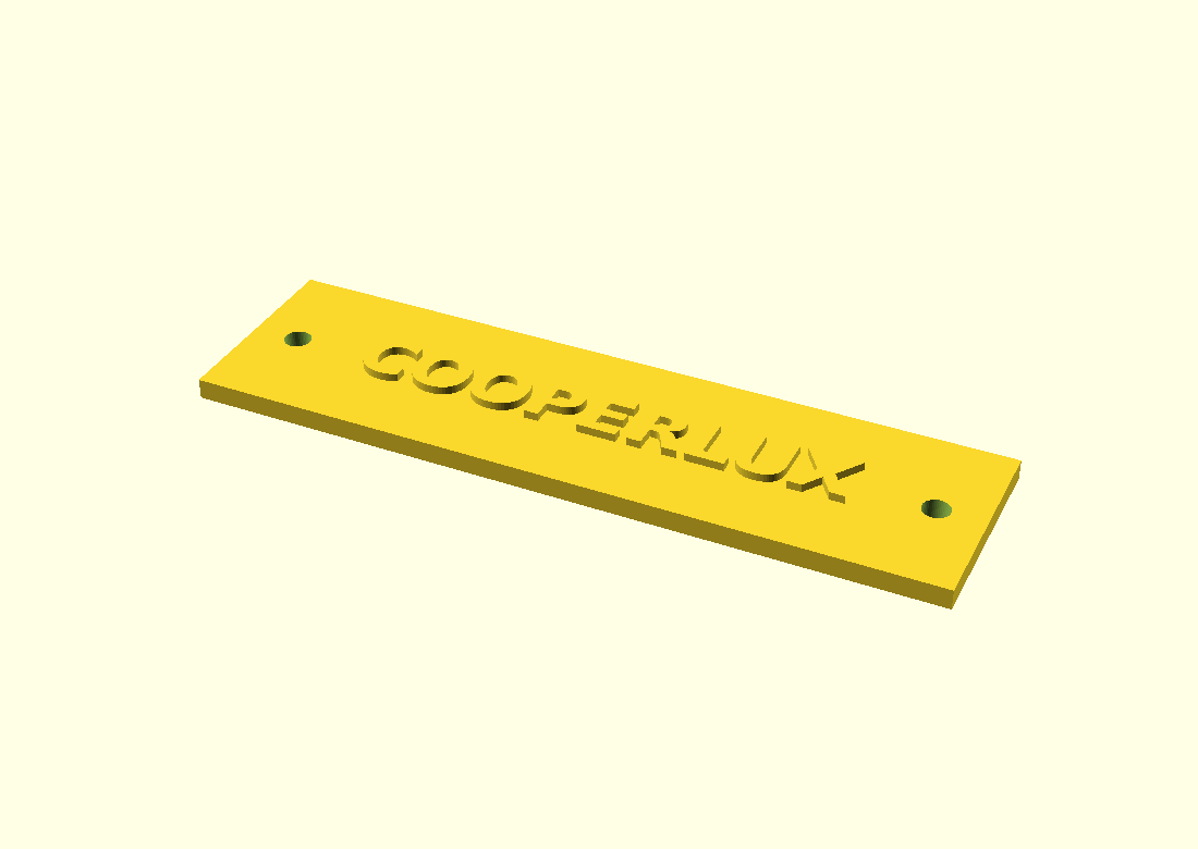 CAD rendering of an equipment label with raised COOPERLUX lettering and two mounting holes